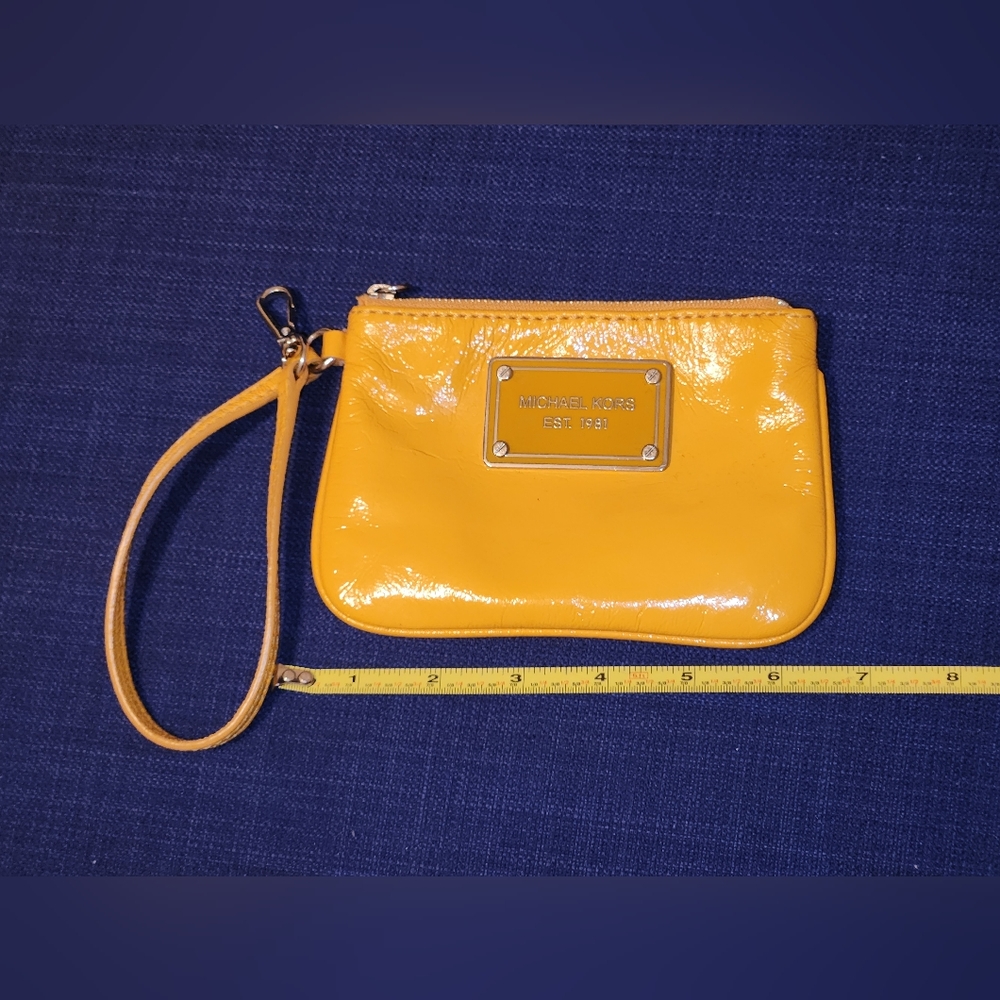 Yellow Michael Kors wristlet